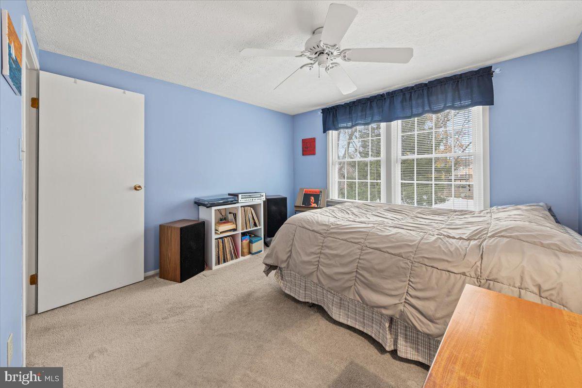 248 Winding Way Marlton, NJ 08053 - Photo 35 of 41 a bedroom with a bed and a large window