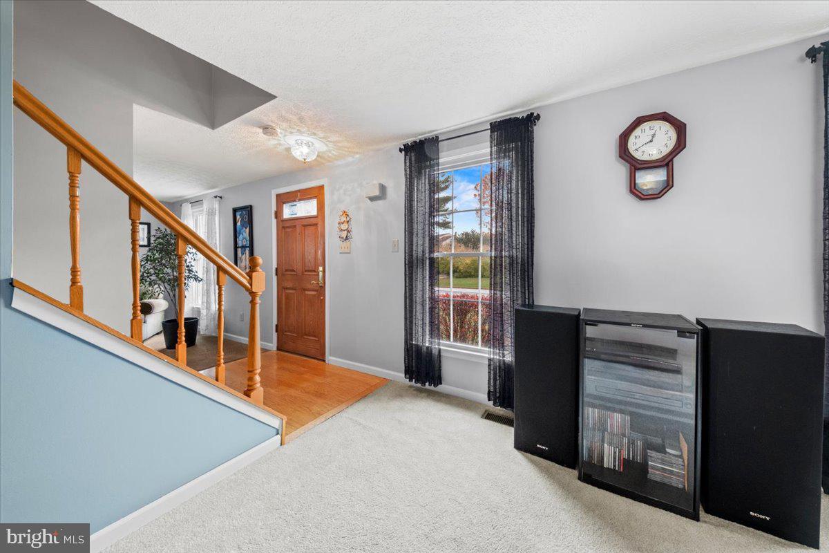 248 Winding Way Marlton, NJ 08053 - Photo 5 of 41 a view of an entryway with hardwood floor