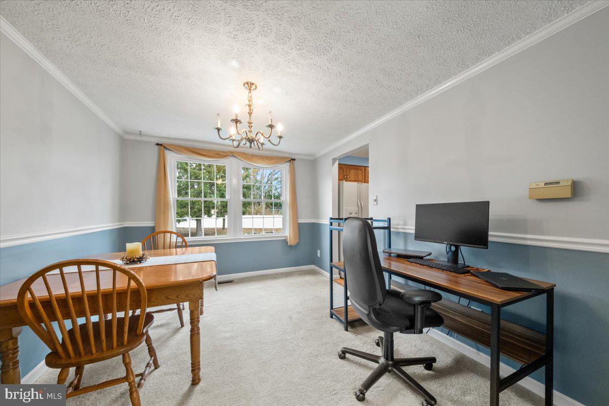 248 Winding Way Marlton, NJ 08053 - Photo 7 of 41 a view of a workspace with furniture and a window