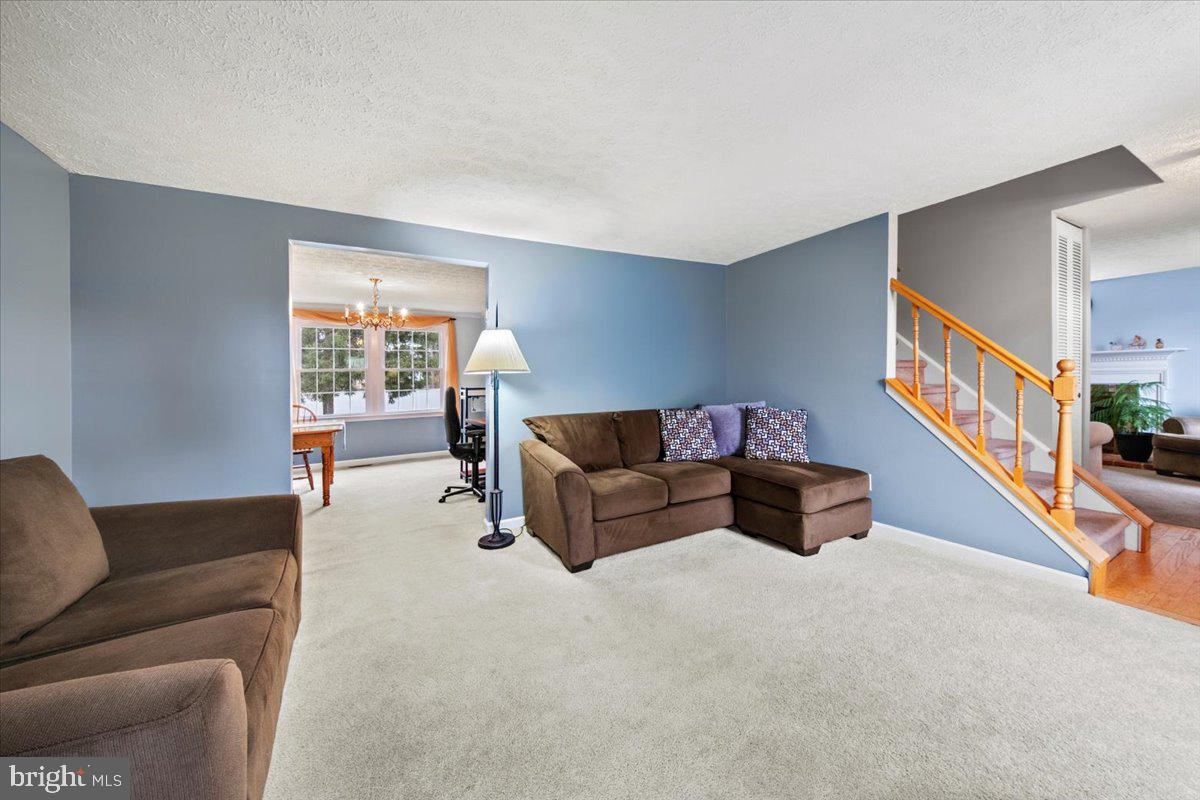 248 Winding Way Marlton, NJ 08053 - Photo 8 of 41 a living room with furniture and a couch