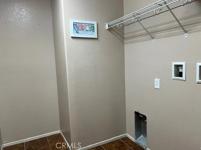 a view of a hallway with closet