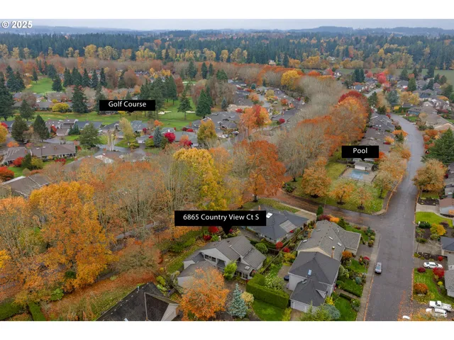 an aerial view of residential house with outdoor space