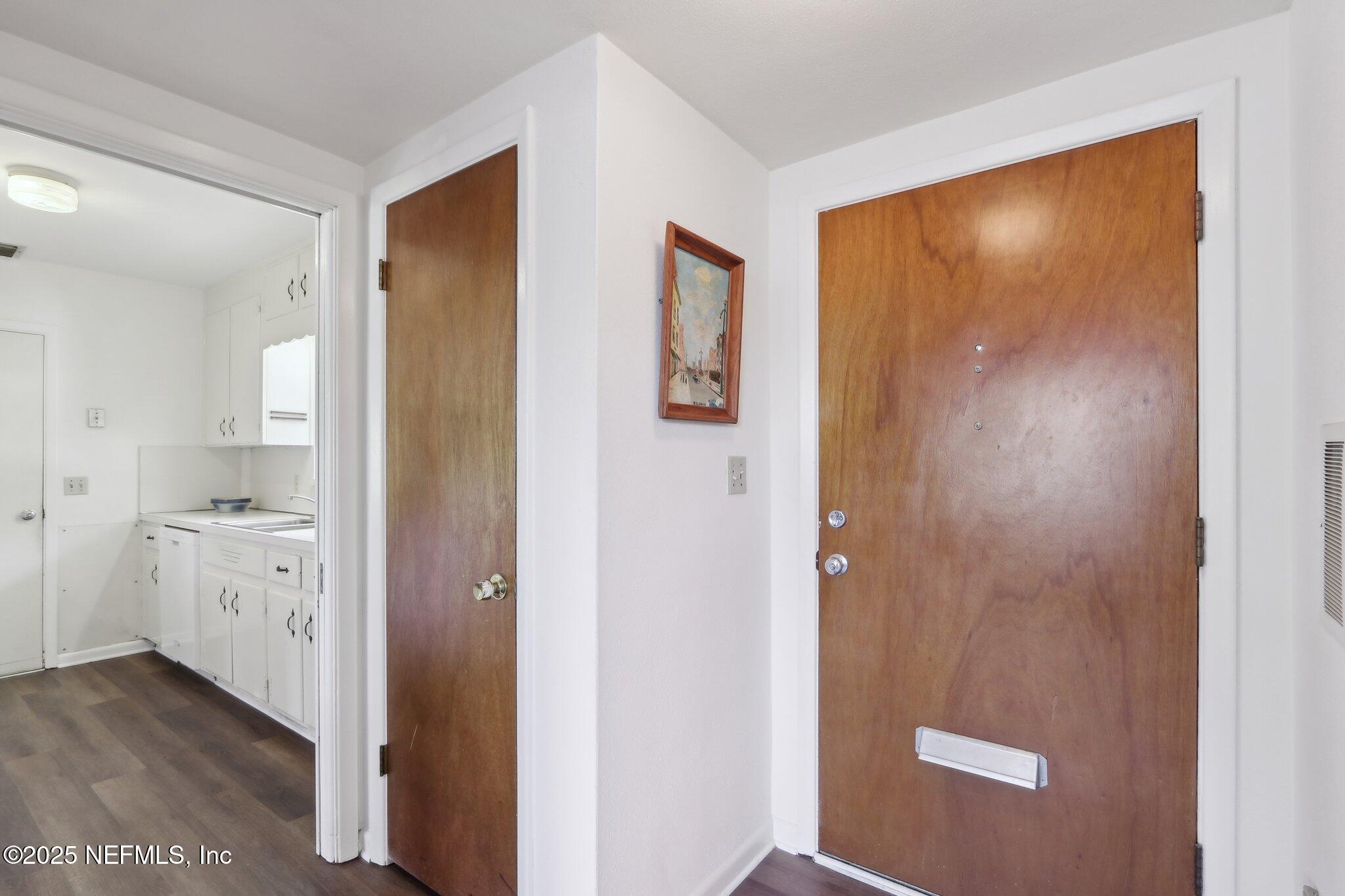 3831 Rogero Road Jacksonville, FL 32277 - Photo 13 of 33 a view of a hallway with closet area