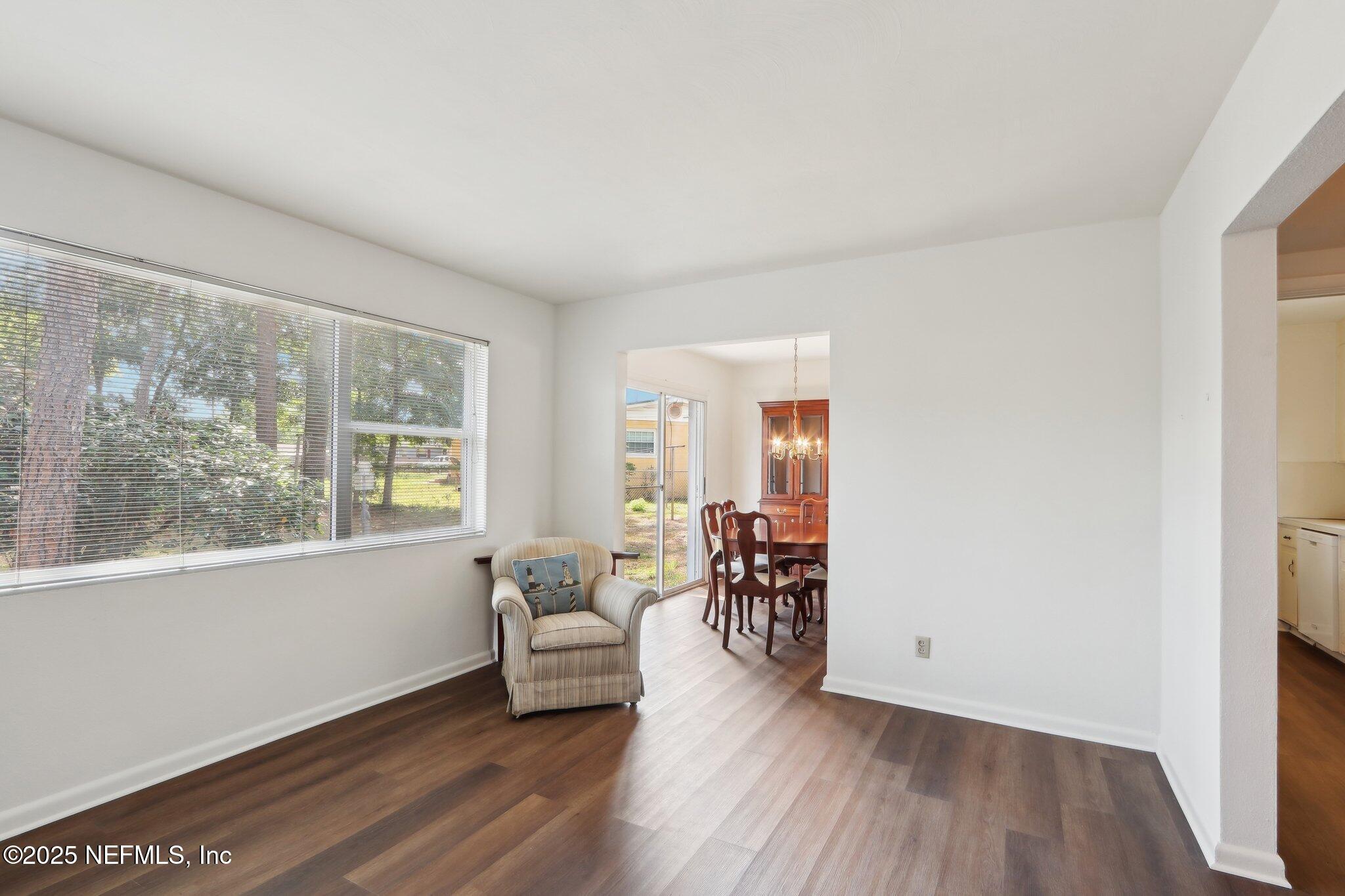 3831 Rogero Road Jacksonville, FL 32277 - Photo 5 of 33 a living room with furniture and a window