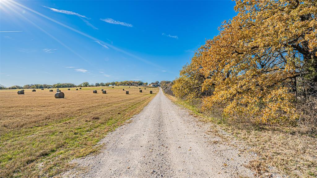 7550 Goodman Lane Azle, TX 76020 - Photo 13 of 19 a view of a large body of water with a building in the background