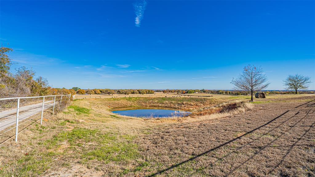 7550 Goodman Lane Azle, TX 76020 - Photo 18 of 19 a view of a swimming pool and an ocean
