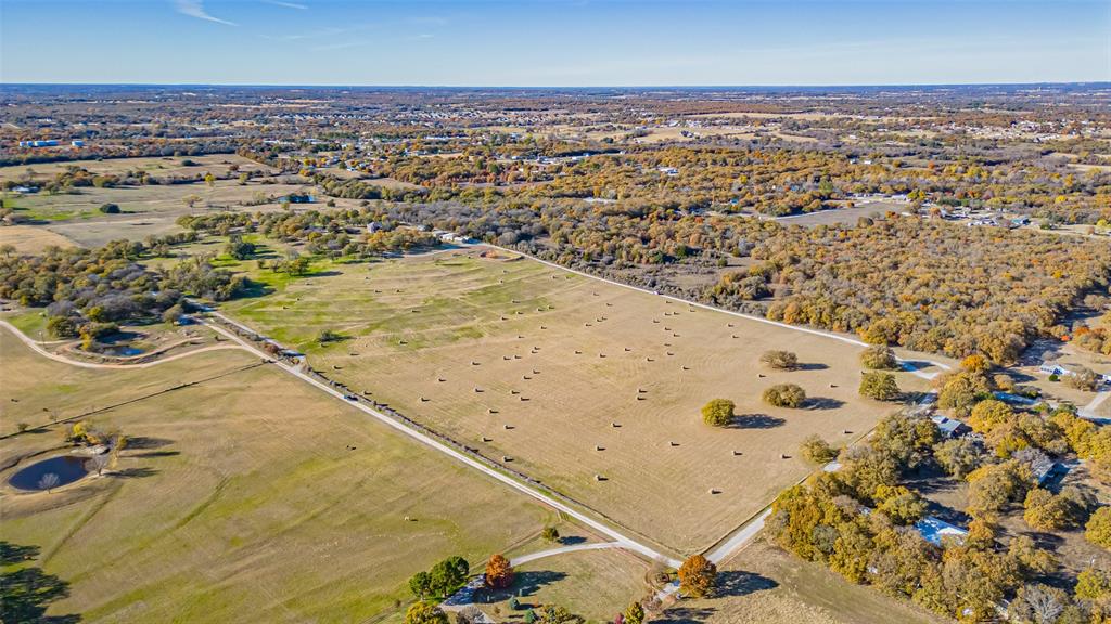 7550 Goodman Lane Azle, TX 76020 - Photo 4 of 19 an aerial view of residential houses with outdoor space