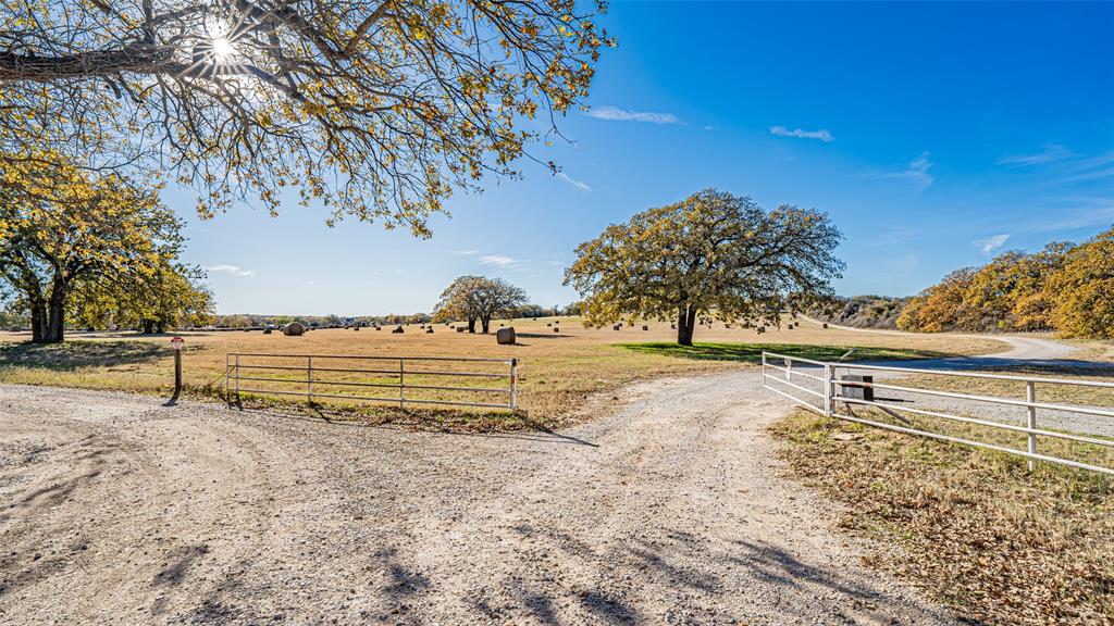 7550 Goodman Lane Azle, TX 76020 - Photo 9 of 19 a view of a yard with wooden fence