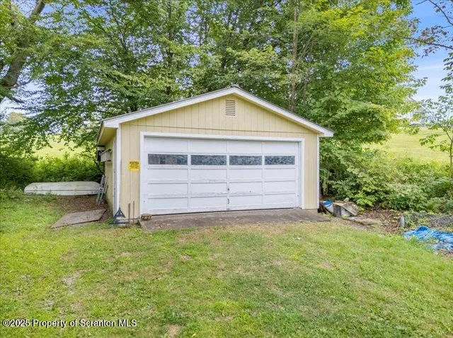 a view of backyard of house