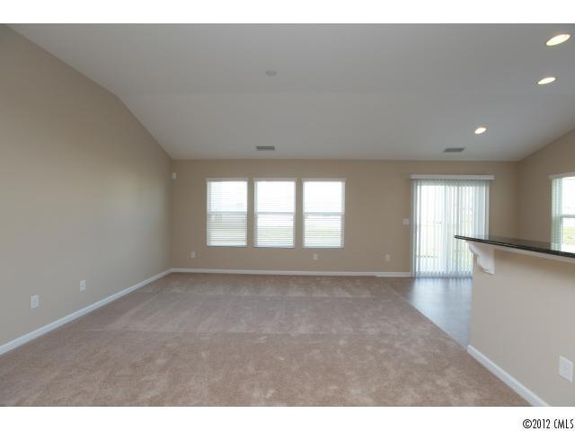 2203 Durand Road, Unit 79 Fort Mill, SC 29715 - Photo 5 of 12 a view of an empty room with a window
