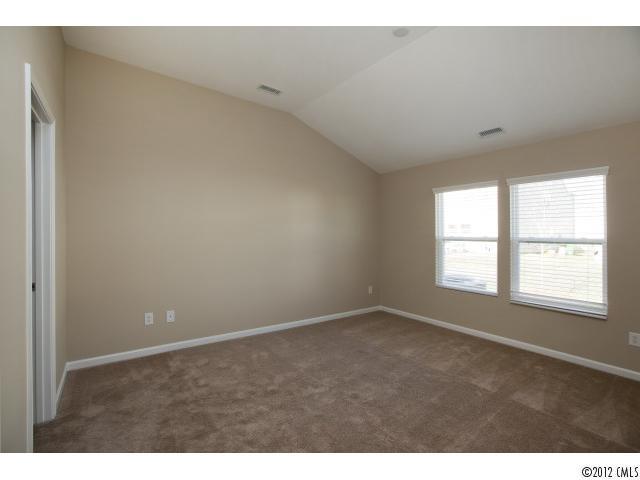 2203 Durand Road, Unit 79 Fort Mill, SC 29715 - Photo 8 of 12 a view of an empty room with a window