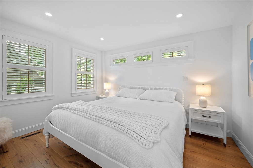 31 Franklin Street Marblehead, MA 01945 - Photo 19 of 35 a bedroom with a bed and a window