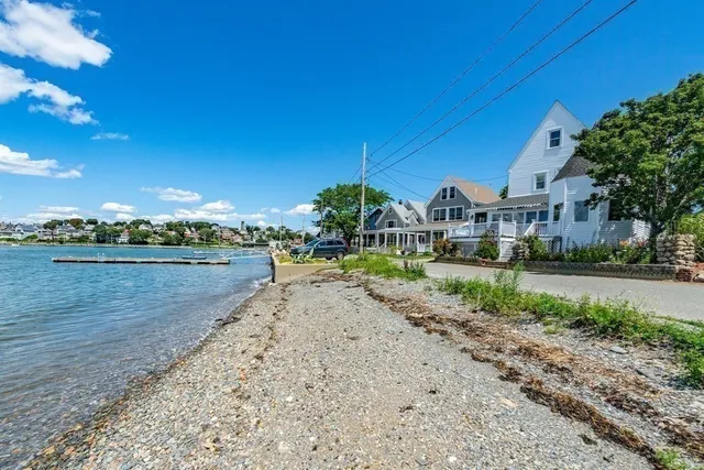 a view of a town with palm trees