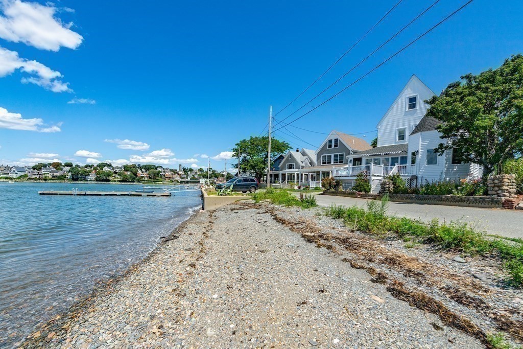 a view of a town with palm trees