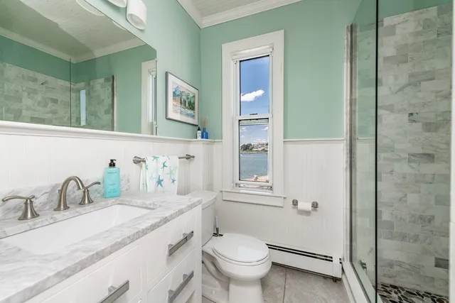 a large kitchen with stainless steel appliances lots of counter top space