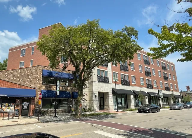 a front view of a building with street view