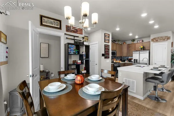 a view of a dining room with furniture