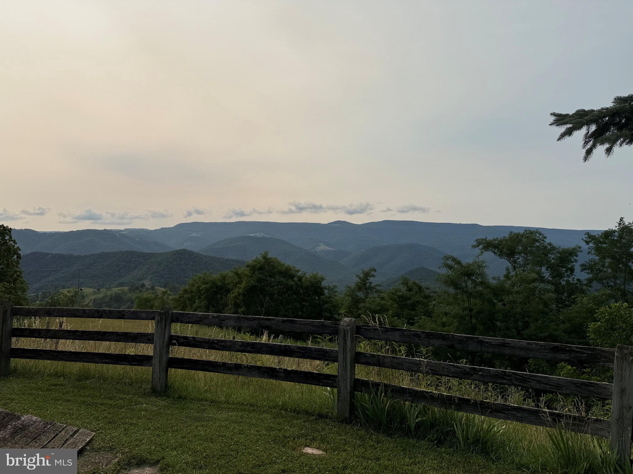 1492 Dice Warner Road Circleville, WV 26804 - Photo 32 of 36 Serene mountain vista at dusk.