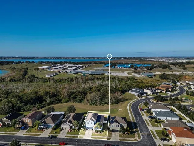 a view of a balcony with cars parked