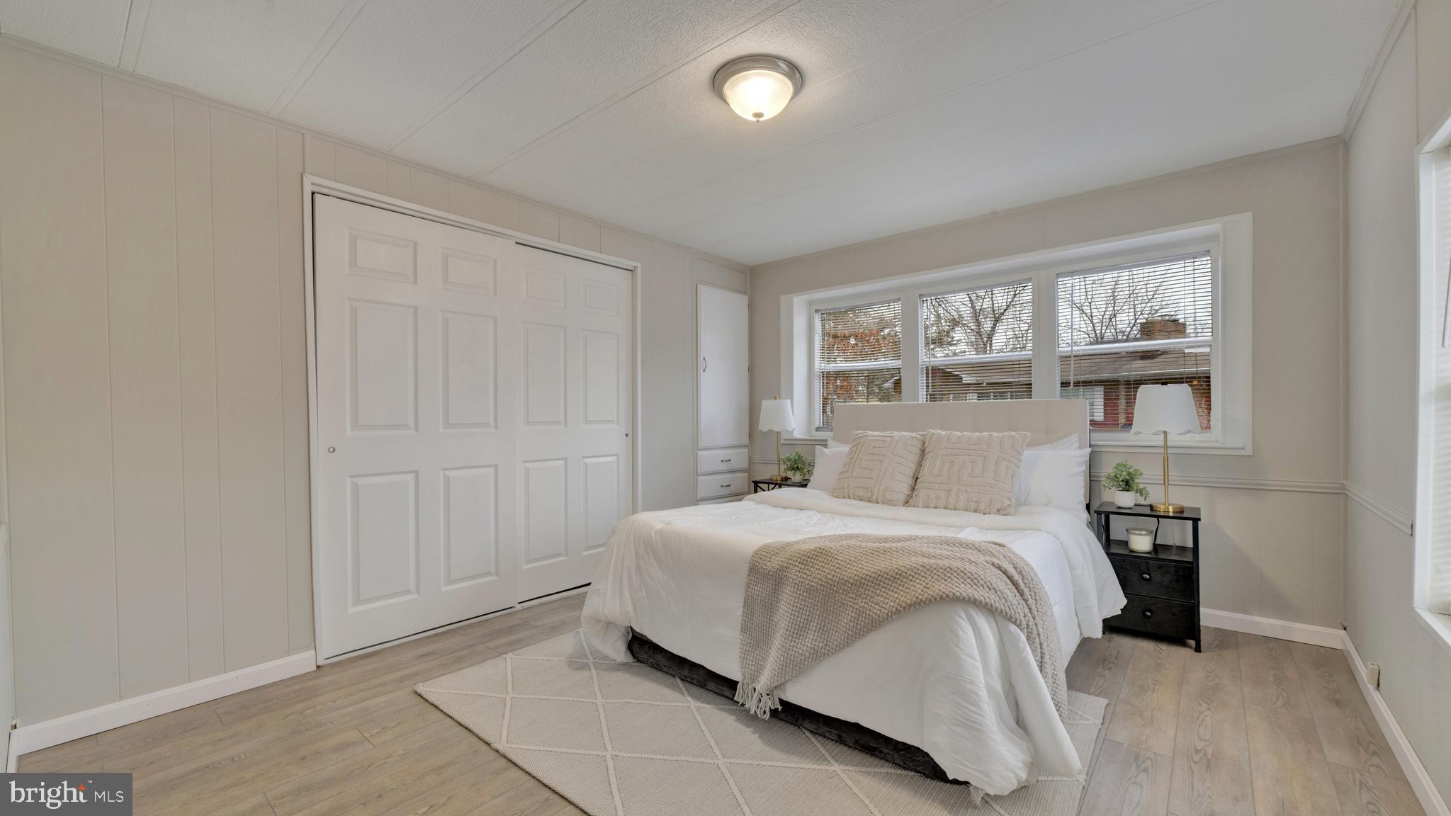 276 5th Street Lothian, MD 20711 - Photo 9 of 18 a bedroom with a bed and a window