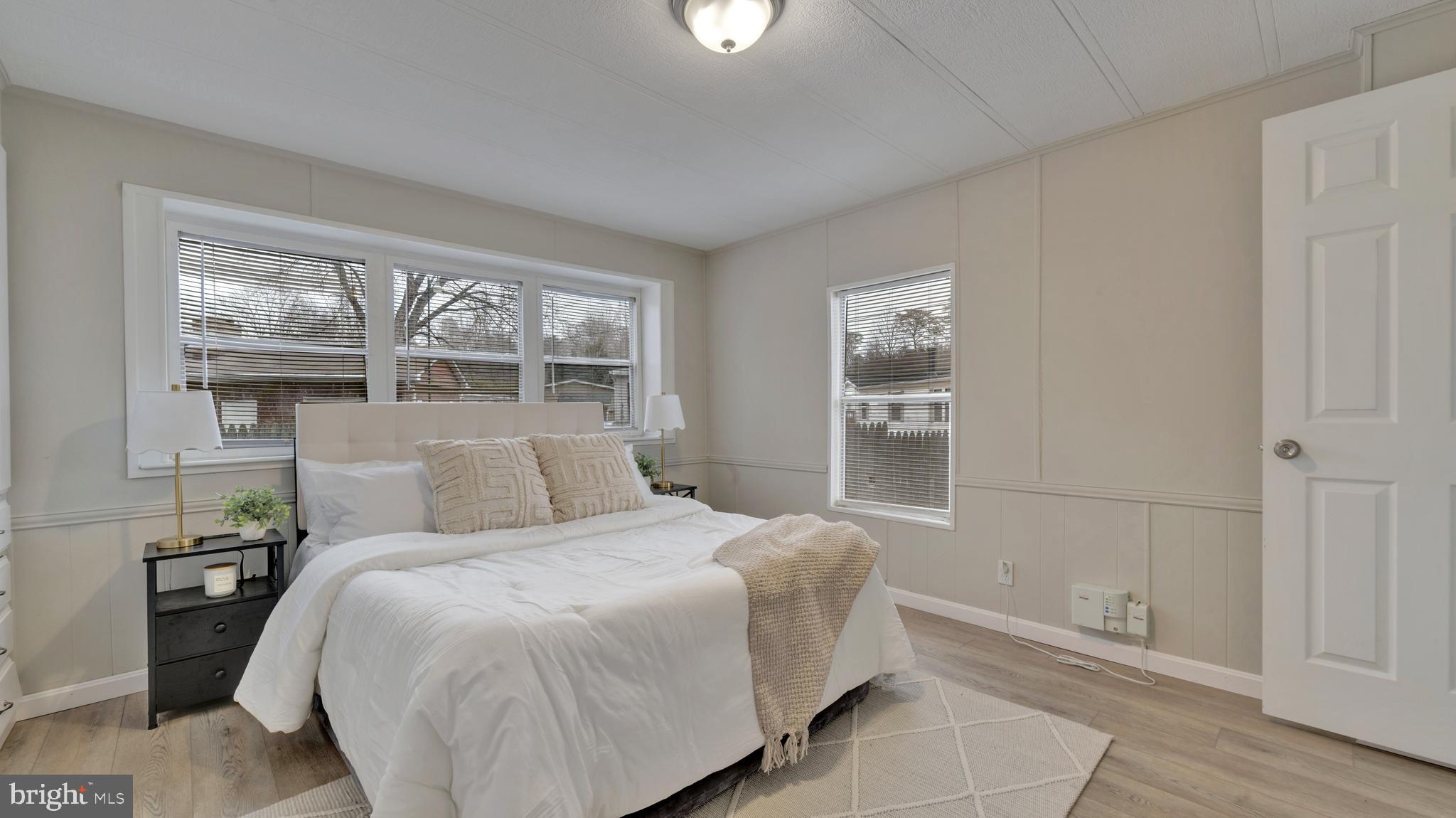 276 5th Street Lothian, MD 20711 - Photo 10 of 18 a bedroom with a bed and a window