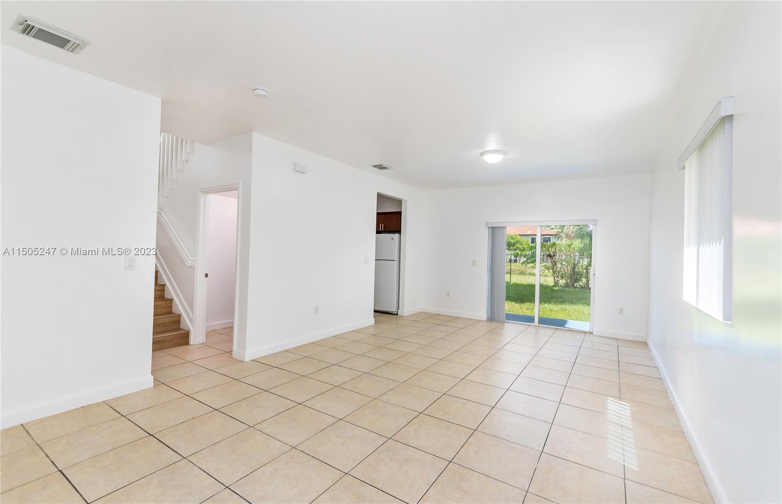 3501 Northeast 4th Street, Unit 3501 Homestead, FL 33033 - Photo 13 of 44 an empty room with windows