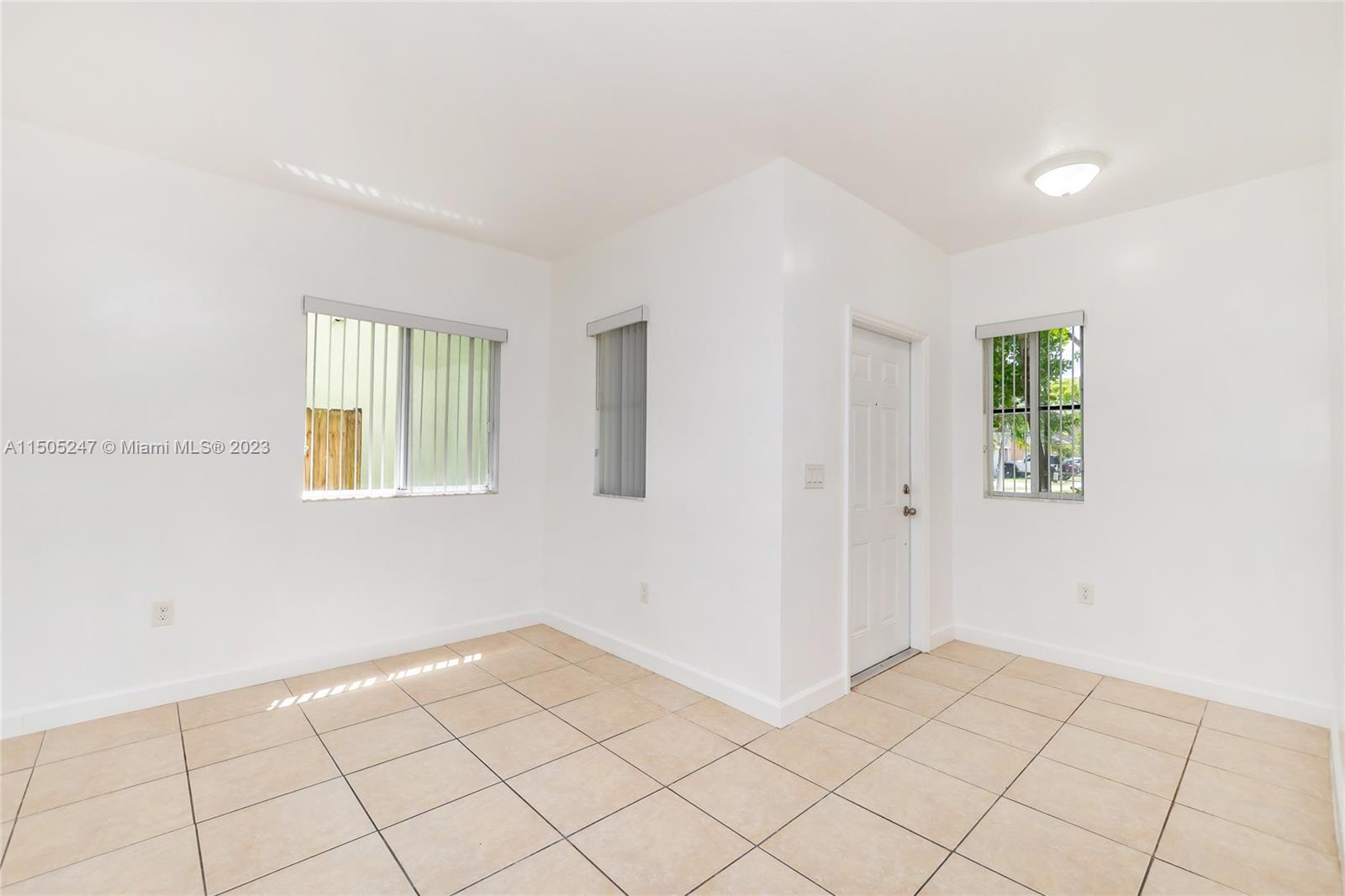 3501 Northeast 4th Street, Unit 3501 Homestead, FL 33033 - Photo 18 of 44 a view of an empty room and window