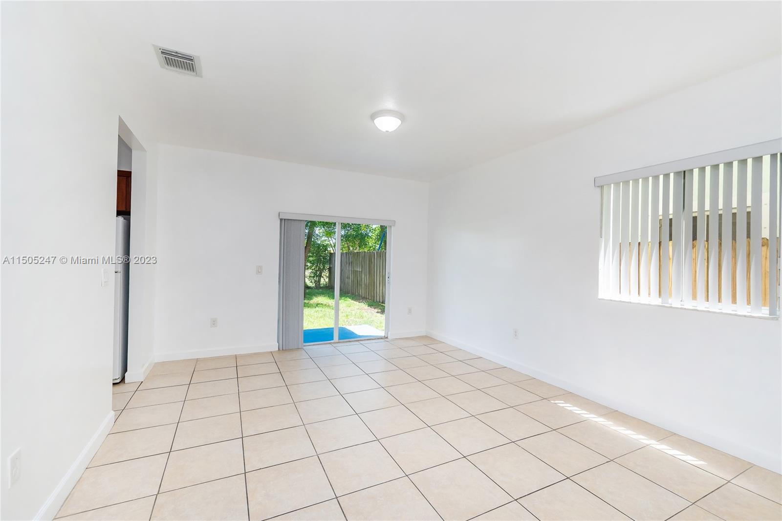 3501 Northeast 4th Street, Unit 3501 Homestead, FL 33033 - Photo 19 of 44 a view of an empty room and window