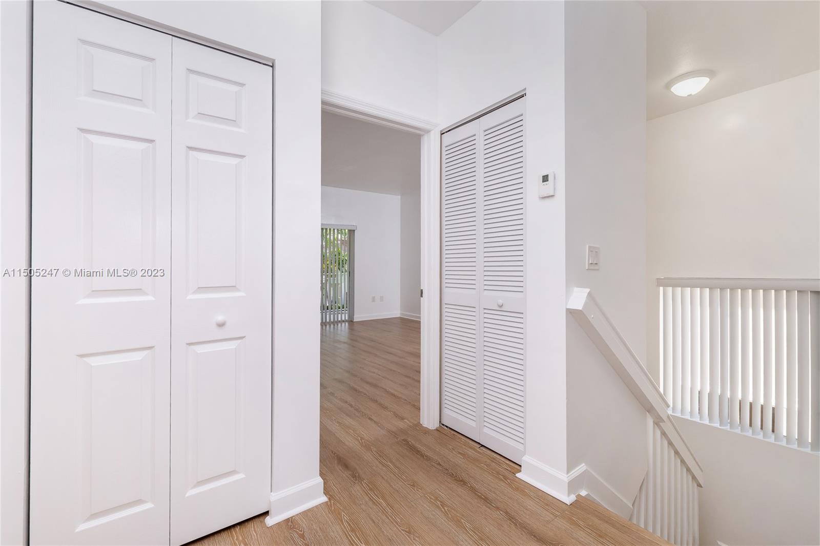 3501 Northeast 4th Street, Unit 3501 Homestead, FL 33033 - Photo 23 of 44 a view of a hallway with wooden floor