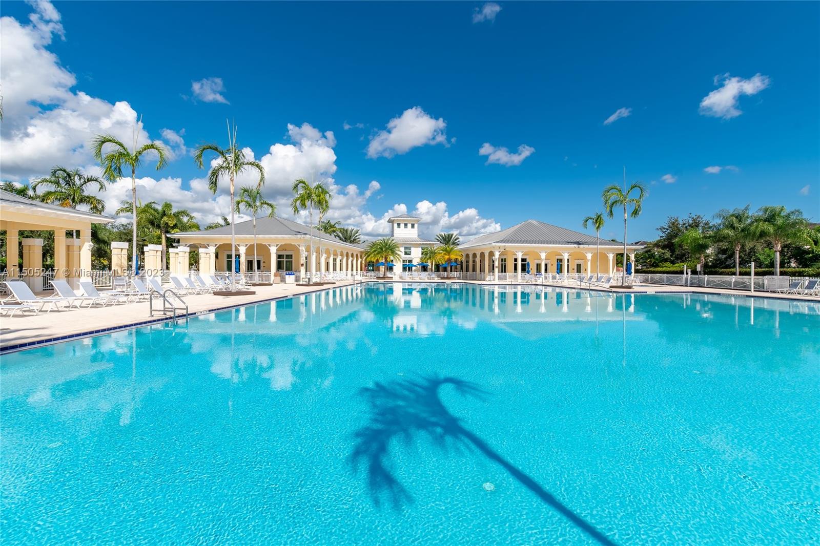 3501 Northeast 4th Street, Unit 3501 Homestead, FL 33033 - Photo 36 of 44 a view of a swimming pool with an outdoor seating