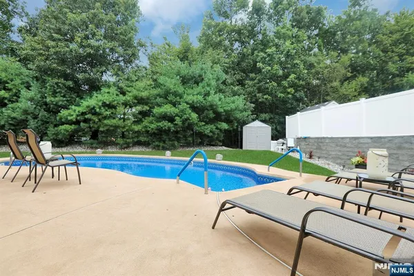 a view of a patio with furniture