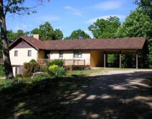 168 Ridgeview Road Northwest Floyd, VA 24091 - Photo 1 of 1 a front view of a house with a garden