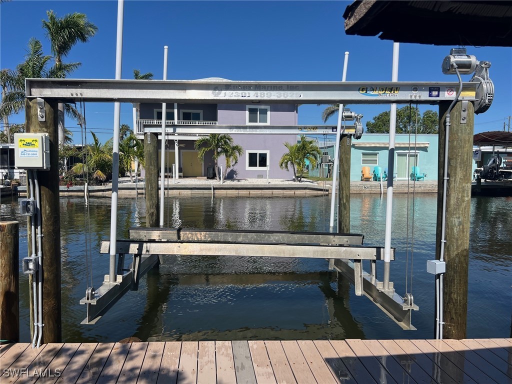 11458 May Street, Unit 1 Matlacha, FL 33993 - Photo 13 of 18 a view of a house with a balcony