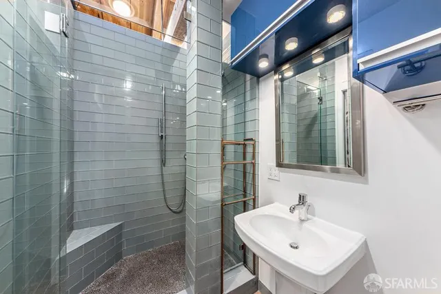 a view of an chairs and table in the balcony