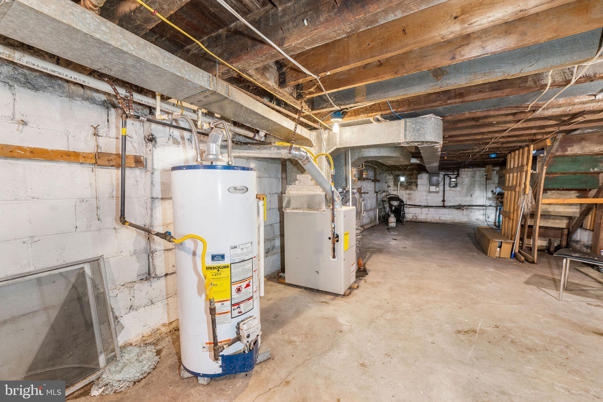 1263 South Merrimac Road Camden, NJ 08104 - Photo 20 of 21 a view of storage and utility room with a sink