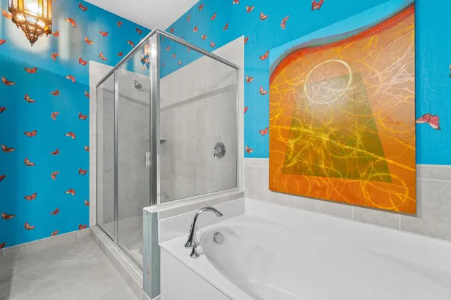 a bathroom with a sink and a shower