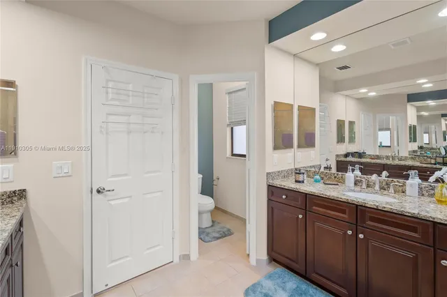 a bed room with a bed and a window