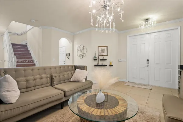a view of livingroom with furniture and stairs