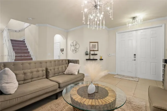 a view of livingroom with furniture and stairs