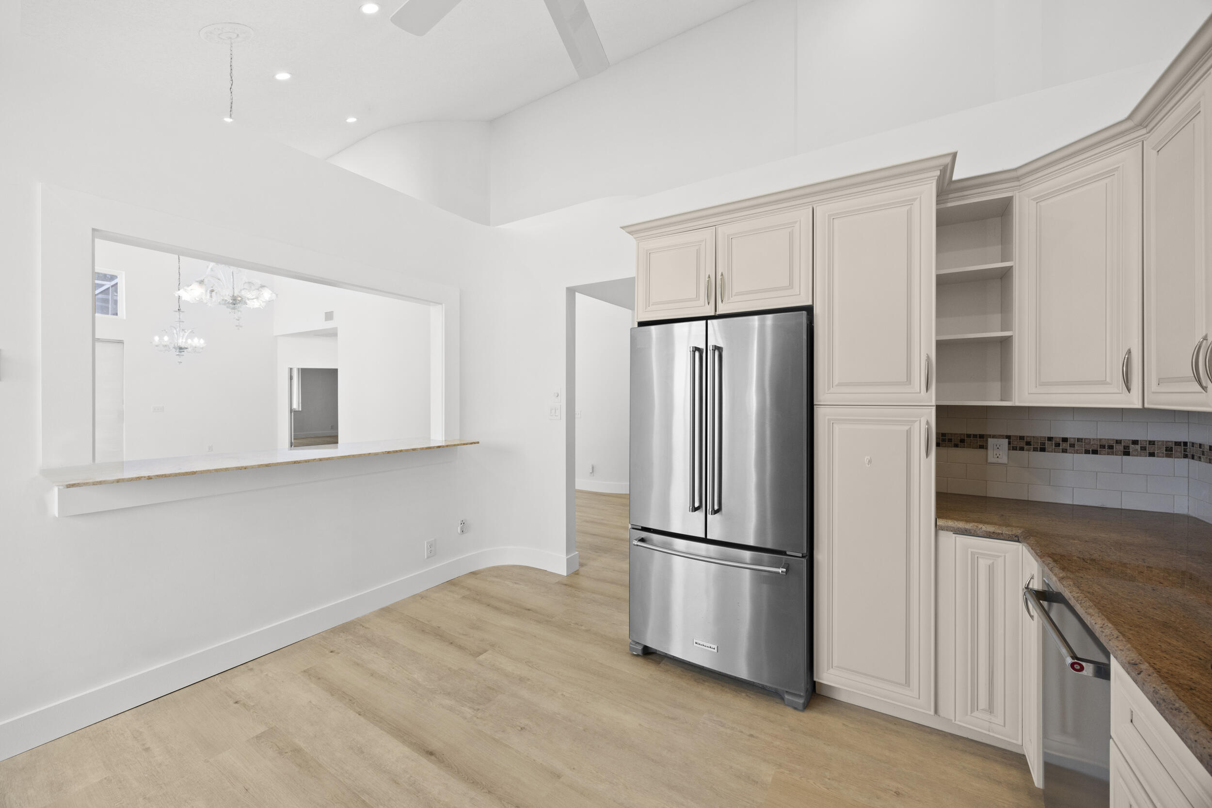 17192 Newport Club Drive Boca Raton, FL 33496 - Photo 15 of 72 a kitchen with stainless steel appliances a refrigerator and a sink