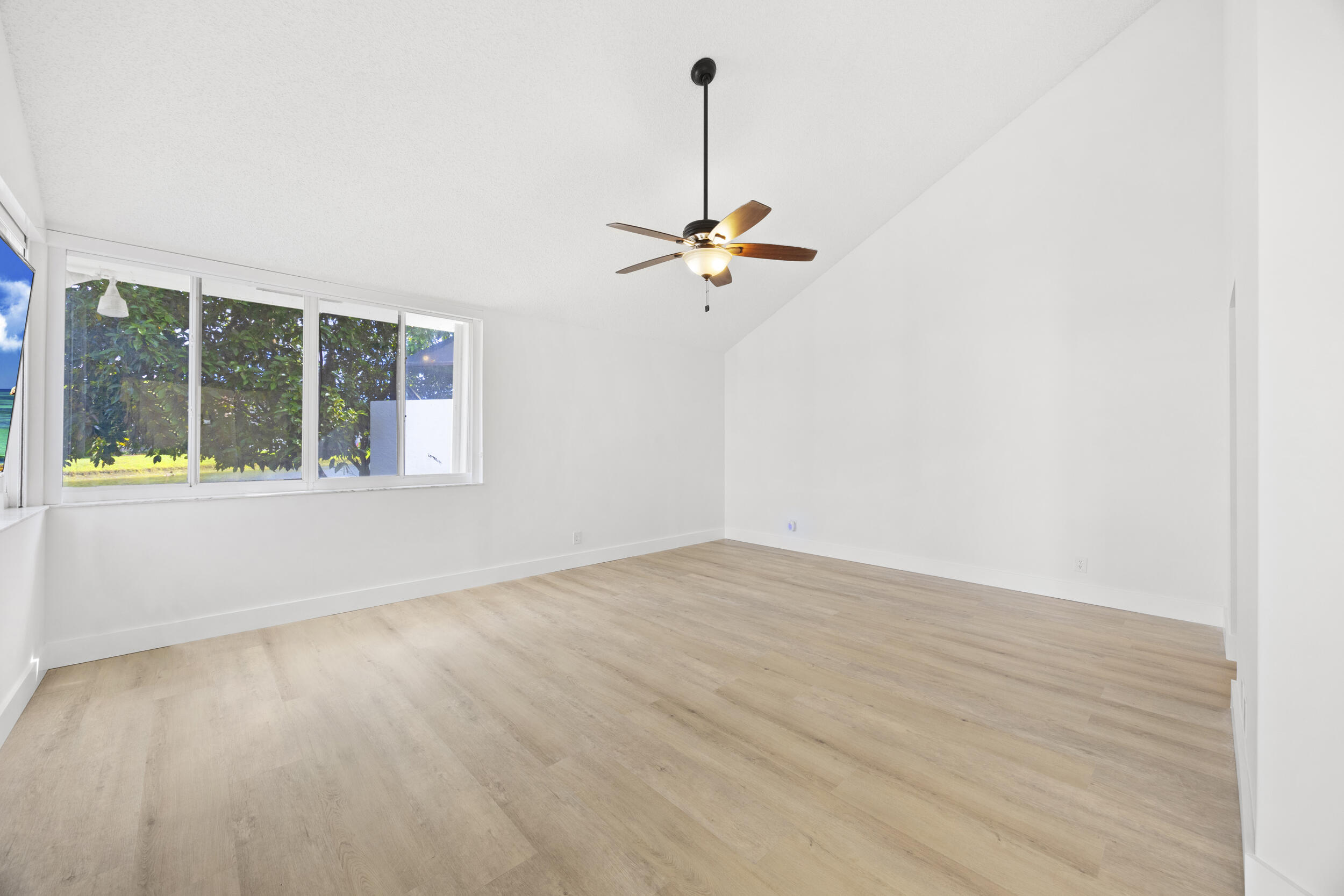 17192 Newport Club Drive Boca Raton, FL 33496 - Photo 21 of 72 a view of an empty room with a window