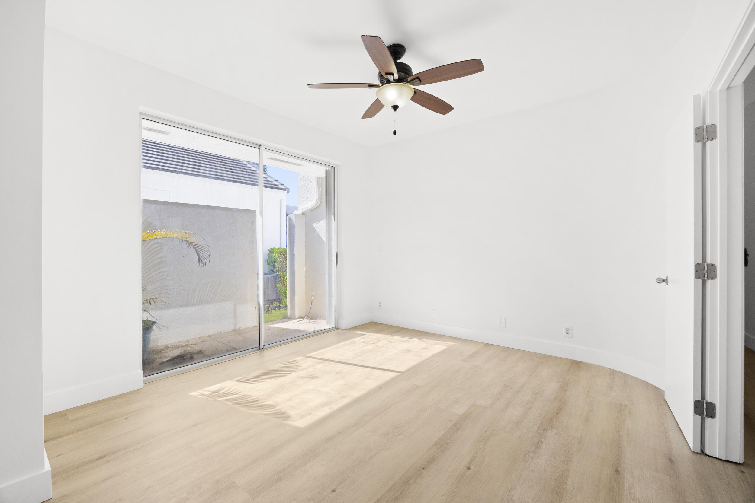 17192 Newport Club Drive Boca Raton, FL 33496 - Photo 39 of 72 a view of a room with a ceiling fan