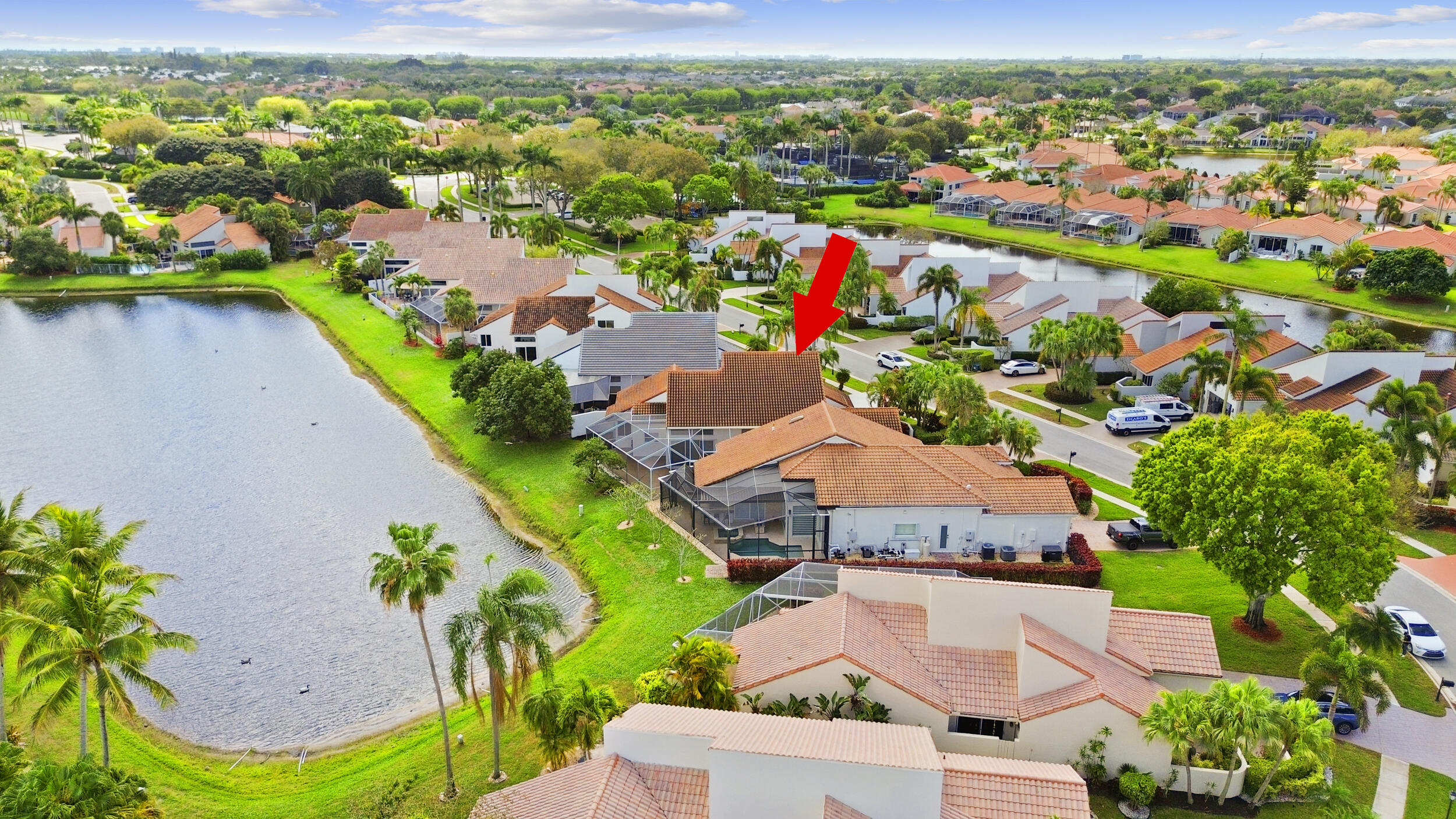 17192 Newport Club Drive Boca Raton, FL 33496 - Photo 66 of 72 an aerial view of residential houses with outdoor space and river view