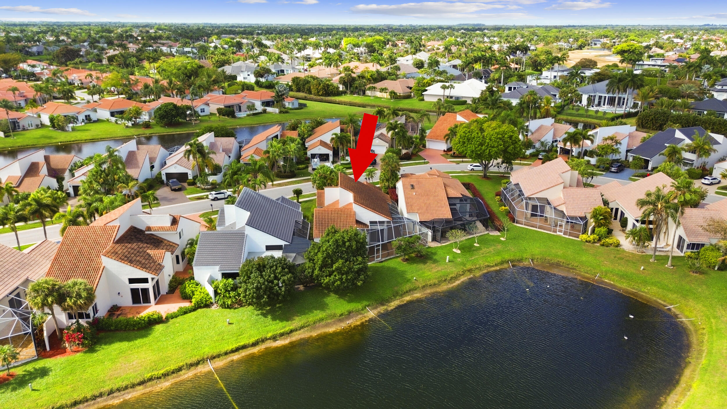 17192 Newport Club Drive Boca Raton, FL 33496 - Photo 68 of 72 an aerial view of residential houses with outdoor space and trees