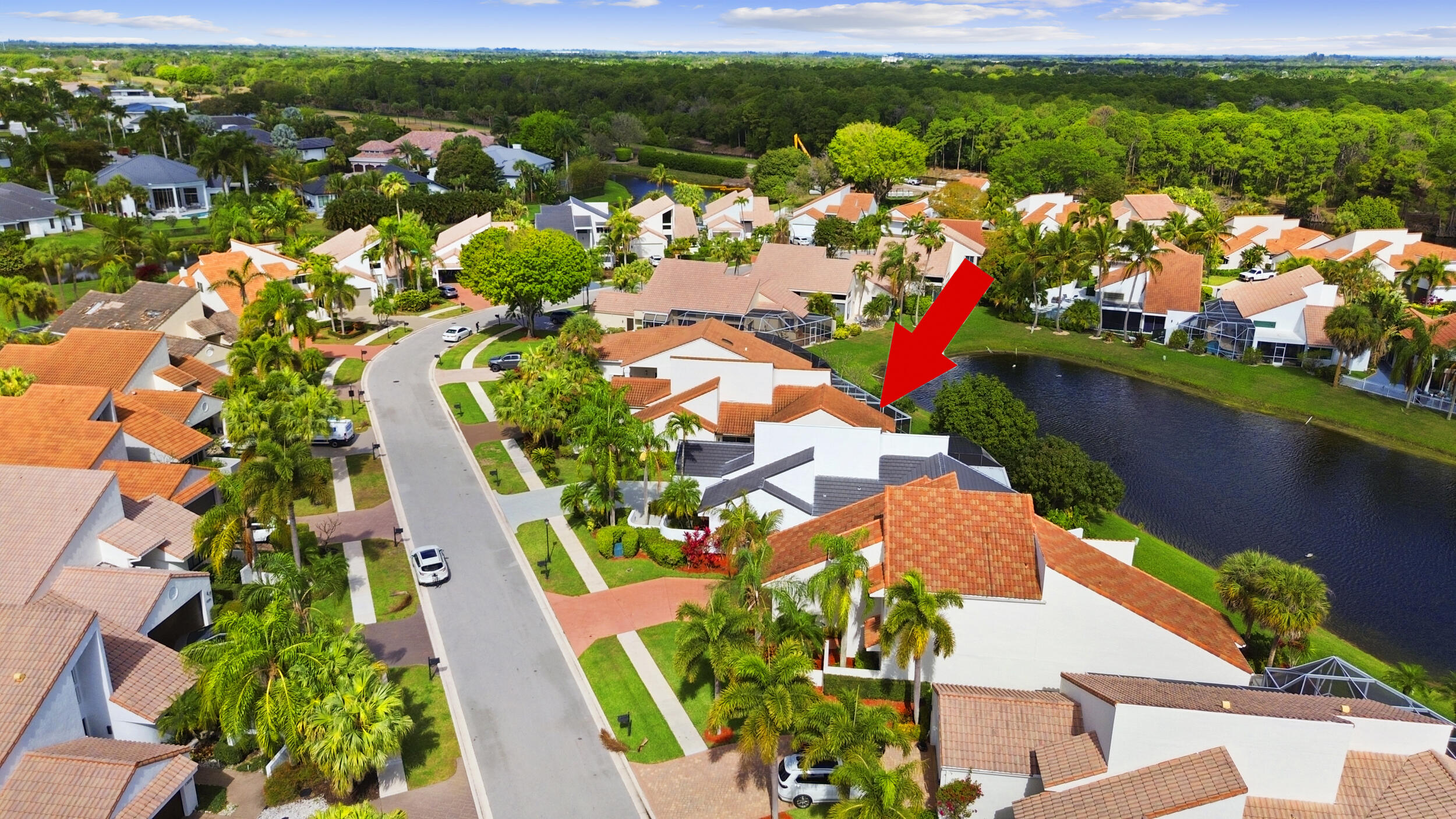 17192 Newport Club Drive Boca Raton, FL 33496 - Photo 70 of 72 an aerial view of a house with a lake view