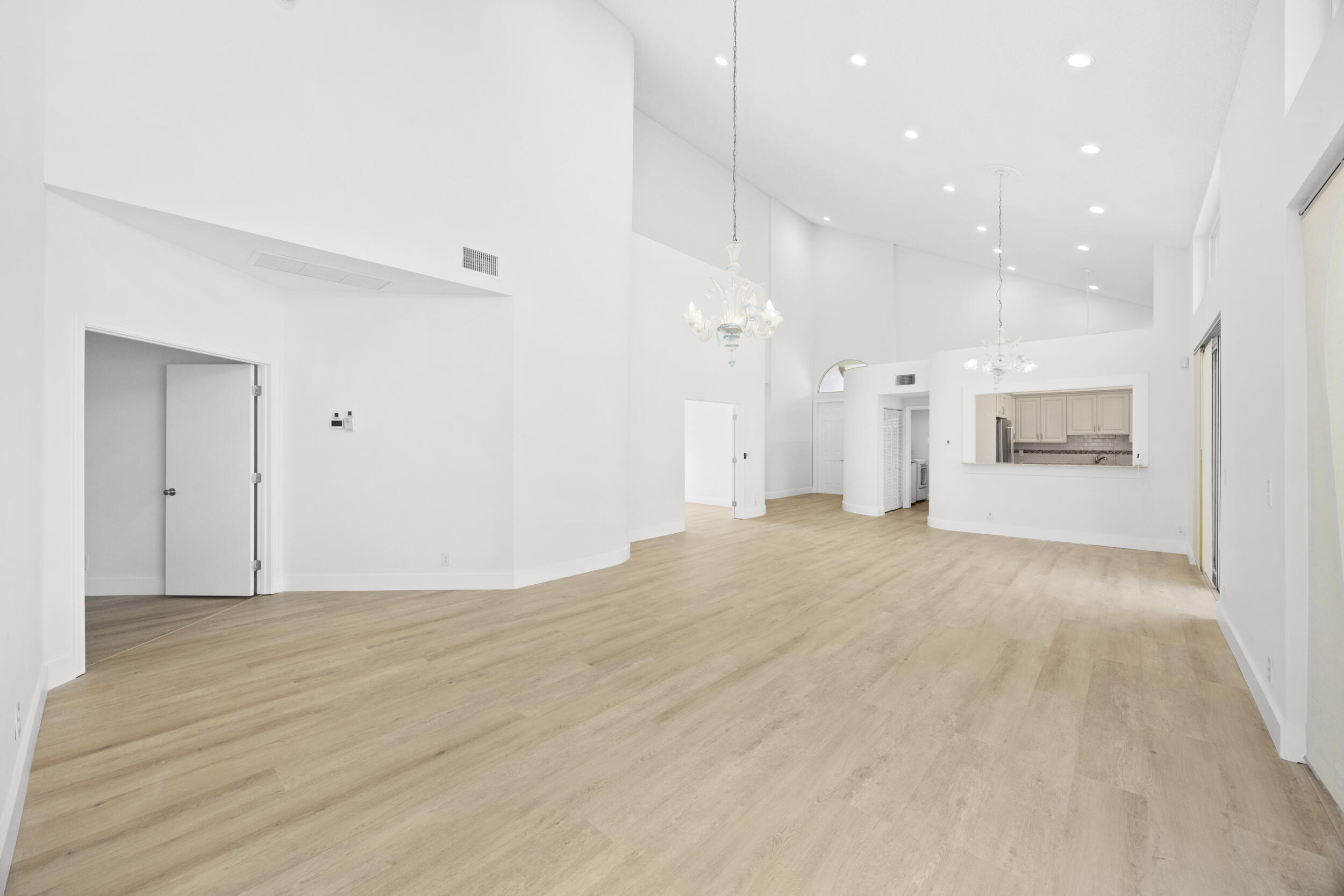17192 Newport Club Drive Boca Raton, FL 33496 - Photo 9 of 72 a view of empty room with wooden floor