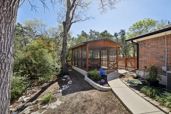 a view of a garden with a patio