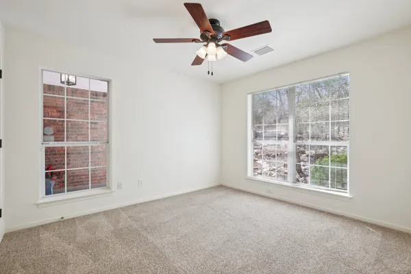 an empty room with windows