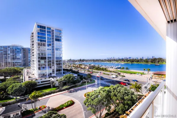 a view of city and swimming pool