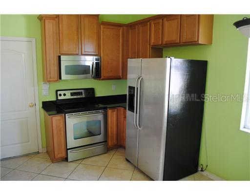 15207 Skip Jack Loop Lakewood Ranch, FL 34202 - Photo 5 of 11 Kitchen